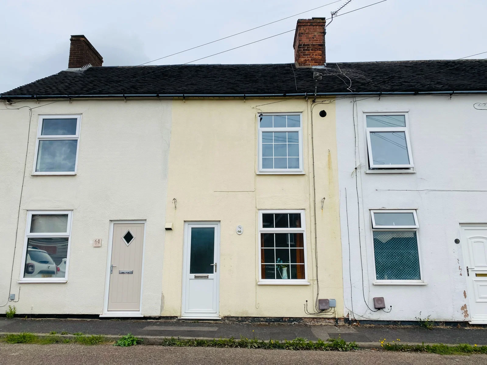 Investment Opportunity: Charming 2-Bed Terrace in Newhall
